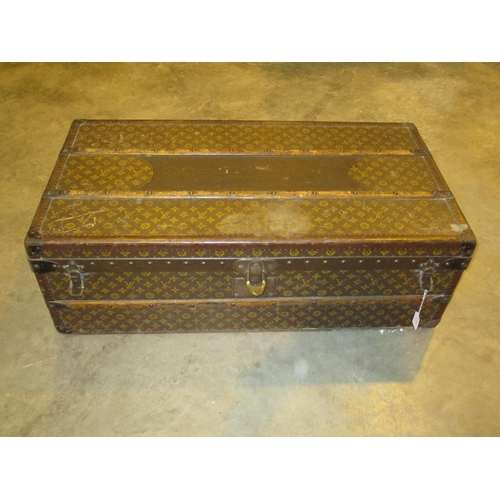 Louis Vuitton Cabin Trunk, Early 20th Century, covered in monogram canvas with Louis Vuitton label and stamped 788196 (?), the interior of the lid with ribbon lace, 34cm high. 100cm wide, 53cm deep