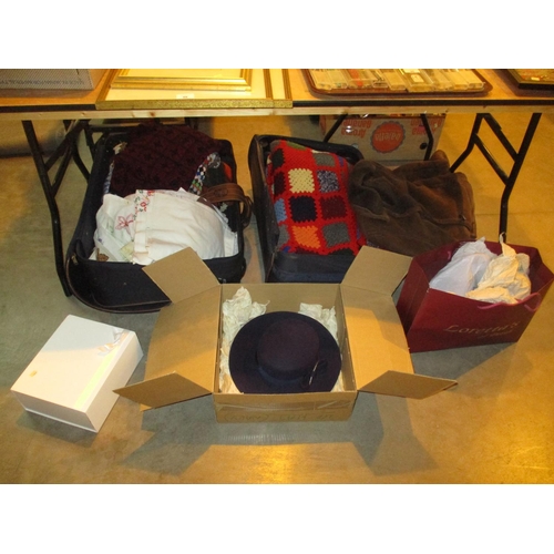 102 - Two Suitcases with Crochet Blankets, Needlework Linen, Sheepskin Coat, Hats and Fascinators