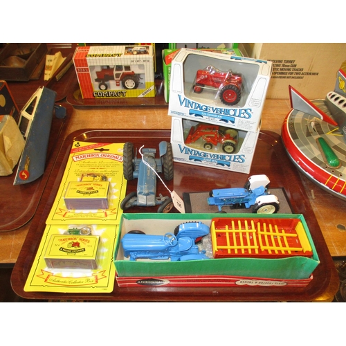 196 - Crescent Dexta Tractor and Trailer, 2 Matchbox, 2 Vintage Vehicles and 2 Other Tractors