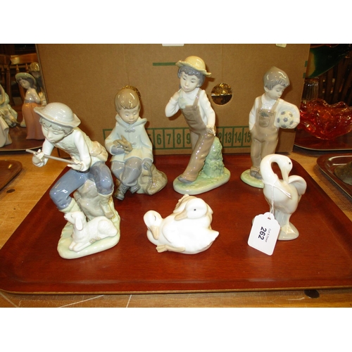 262 - Four Nao Figures and Ducklings and a Lladro Goose