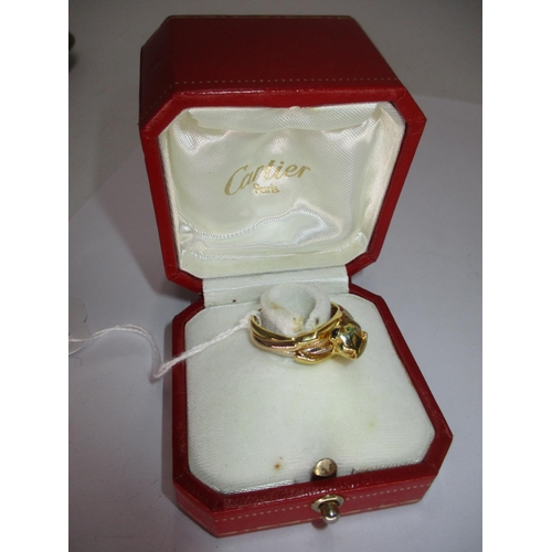 Cartier 750 Gold Panther Ring having Emerald Eyes and Onyx Nose, stamped D34689, 53, 12.49g, Size O, with box