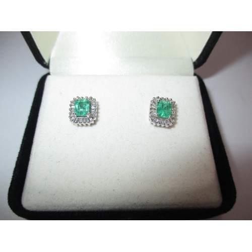 505 - Pair of 18K White Gold Colombian Emerald and Diamond Stud Earrings, total gem weight 1.250 cts