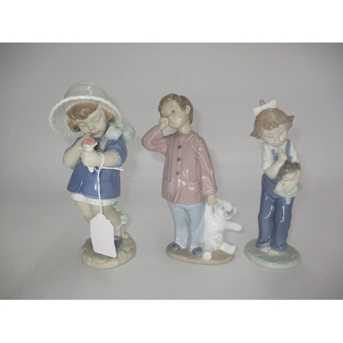 531 - Three Nao Figures of Children