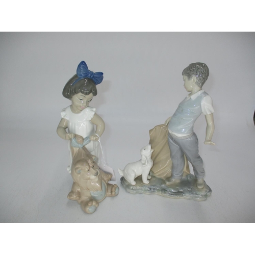 532 - Two Nao Figures, Boy with Dog and Girl with Toy Lion