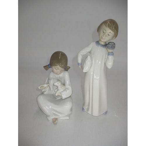 534 - Two Nao Figures, Girl with Lamp and Boy with Pillow and Clock