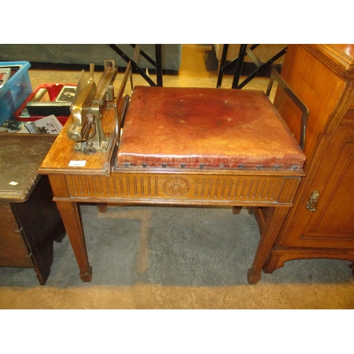 666 - W&T AVERY; a set of late 19th/early 20th century oak jockey scales, with leather seat and brass fram... 