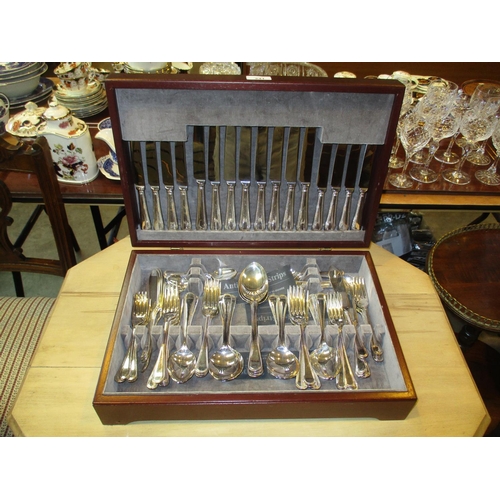 241 - Mahogany Canteen with an 8 Place Setting of Silver Plated Cutlery