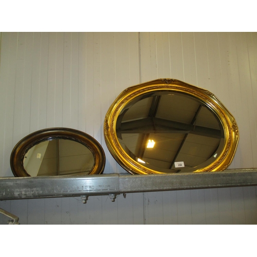 258 - Two Oval Gilt Frame Mirrors