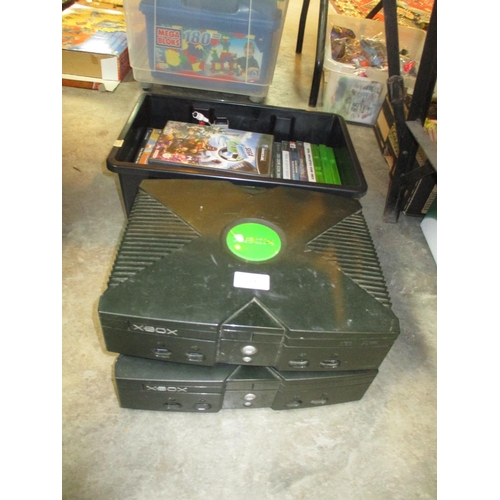 61 - Two Xbox Consoles and a Box of Various Games