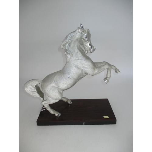 290 - Metal Rearing Horse on a Plinth, 37cm high