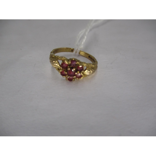 327 - Ruby Seven Stone Flower Head Cluster Ring in 9ct Gold Mount, 1.8g