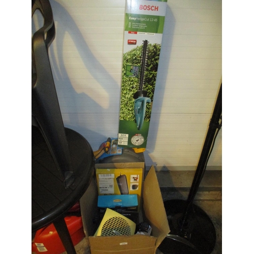 574 - Hozelock Hose and Reel, Bosch Hedge Cutter, 2 Watering Cans and a Box of Items