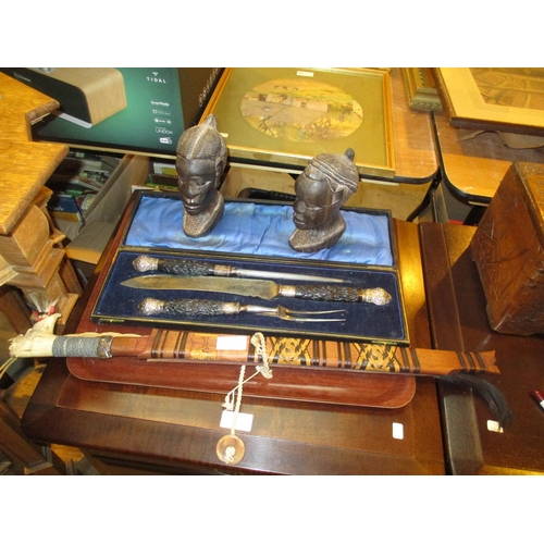 181A - Victorian Horn Handle Carving Set, Pair of African Carved Wood Busts and an Ethnic Knife