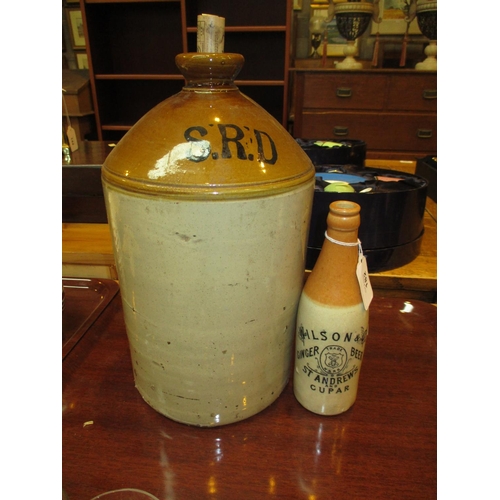 182 - Stoneware Ginger Beer Bottle For Wilson & Co St. Andrews and Cupar, along with a Stoneware Flagon