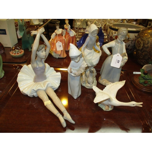 40 - Two Nao Figures, 2 Lladro Figures and a Swan