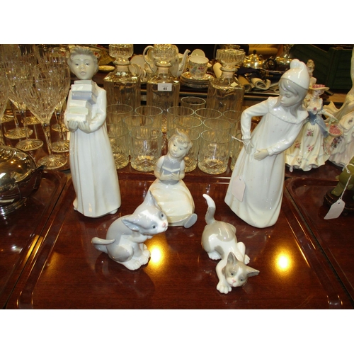 46 - Three Nao Figures and 2 Lladro Cats