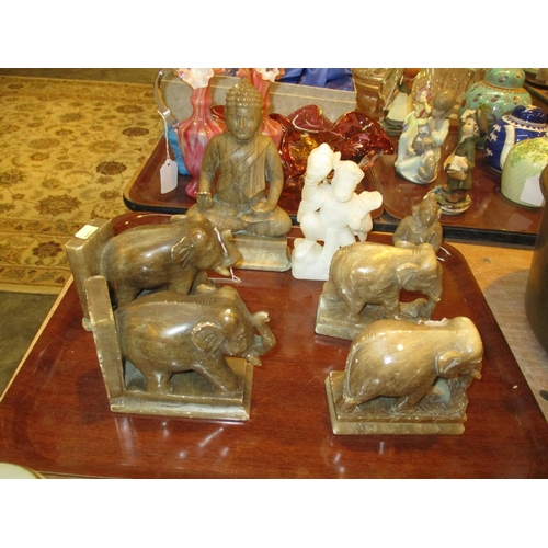 7 - Three Eastern Carved Soapstone Figures and 4 Elephants