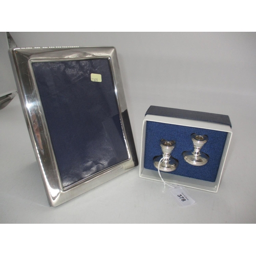 378 - Modern Silver Photograph Frame and a Pair of Candlesticks