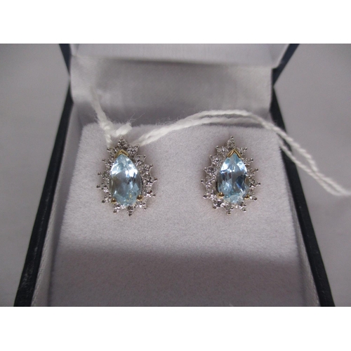 452 - 9ct Gold Blue Topaz and Diamond Earrings