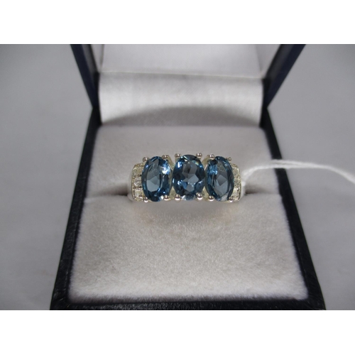 453 - Blue Topaz and White Topaz Ring