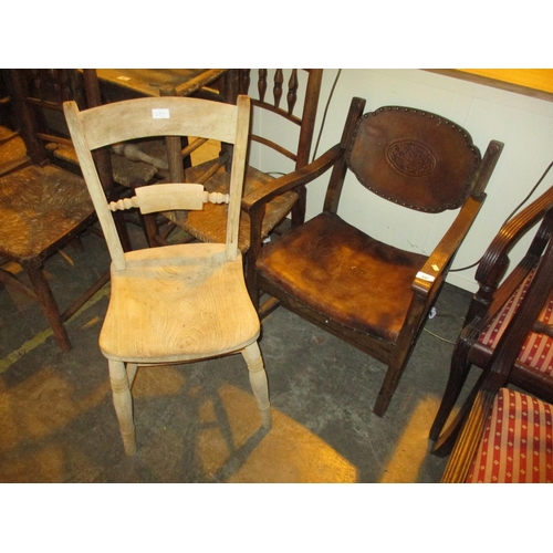 697 - Leather and Oak Arm Chair and a Kitchen Chair