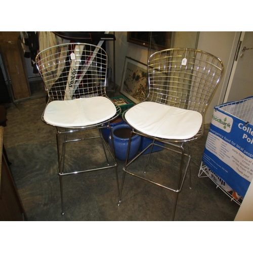 593 - After Harry Bertoia a Pair of Chromed Steel Bar Stools