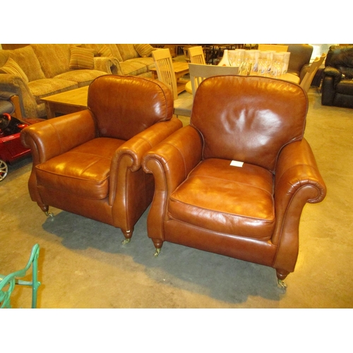 Pair of Tan Leather Easy Chairs