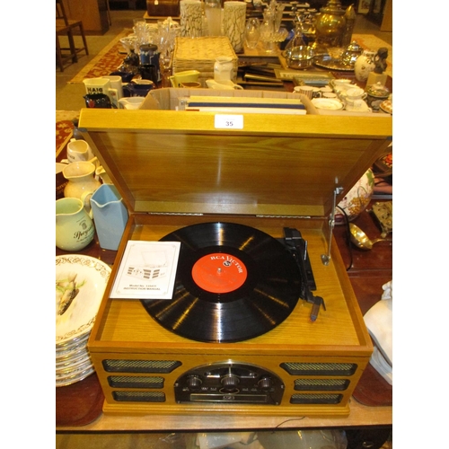 35 - Crosley Music Centre and a Box of Records