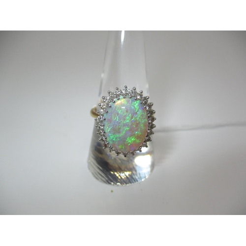 283 - 18ct Gold Opal and Diamond Ring, 5.37g, Size P, opal approx 15x10mm