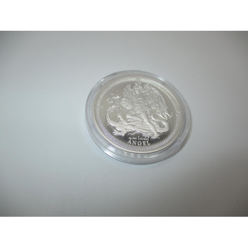 372 - Isle of Man 2021 One Ounce 999 Silver Angel, shows angel slaying a dragon with legend ag999 1 ounce ... 