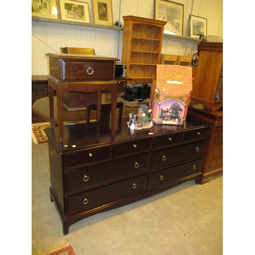 469 - Stag Minstrel Chest of 8 Drawers and a Bedside Table, 155 and 44cm