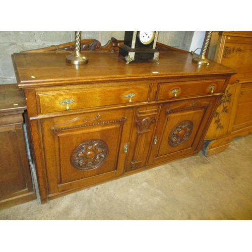 597 - 1920's Carved Oak Sideboard, 152cm