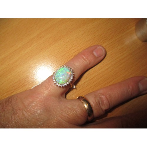 283 - 18ct Gold Opal and Diamond Ring, 5.37g, Size P, opal approx 15x10mm