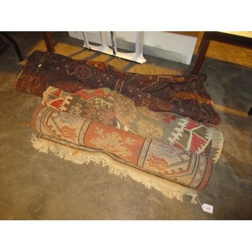 176 - Three Eastern Rugs, poor condition