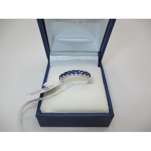 406 - 9ct White Gold 9 Blue Stone Ring, 1.43g, Size N