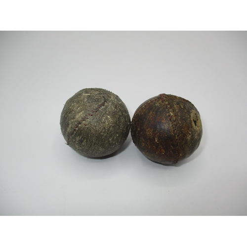 446 - Two Stitched Feathery Golf Balls, each approx 4.5cm diameter