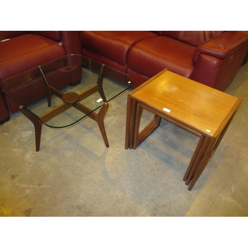 618 - Teak and Glass Coffee Table and a Teak Nest of 3 Tables, glass small chip, nest top marked