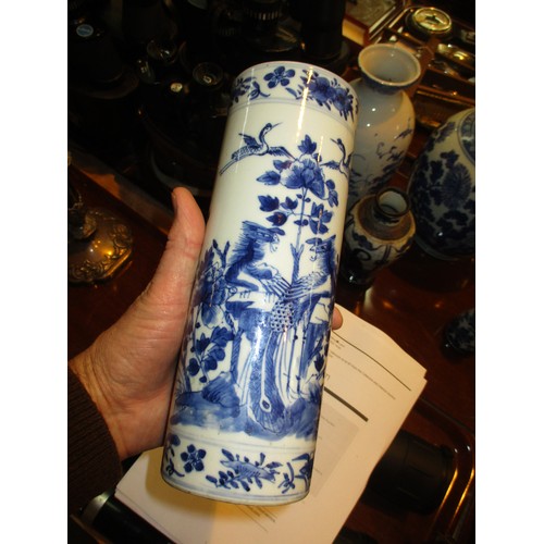 81 - Four Oriental Blue and White Vases and a Sake Bottle, large vase damaged, cylindrical vase cracked, ... 