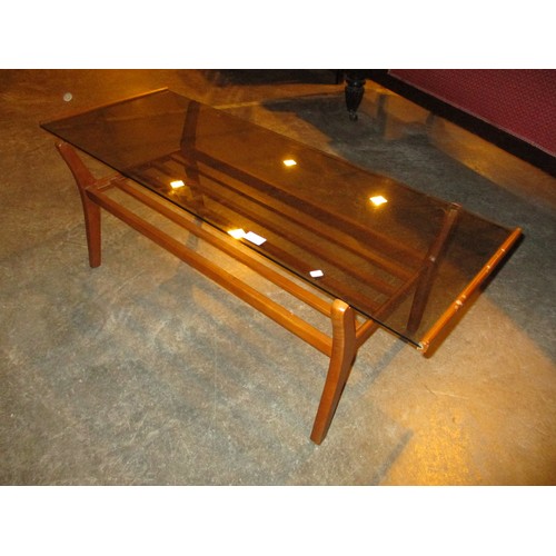 596 - Glass Top Coffee Table, Newsrack Table and a Nest of Tables