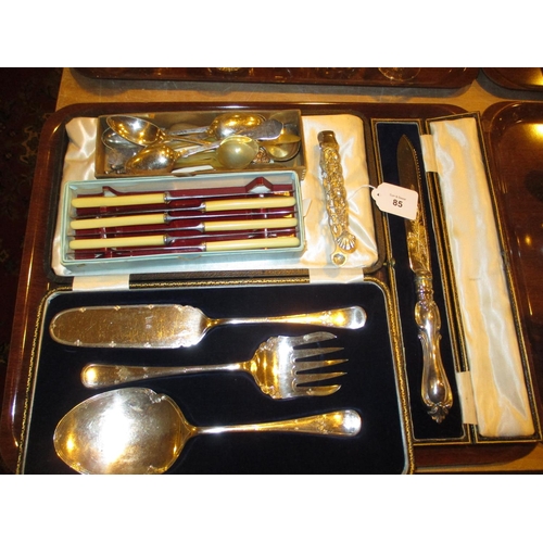 85 - Pair of Silver Sugar Tongs, Silver Plated Serve Alls, Bread Knife etc