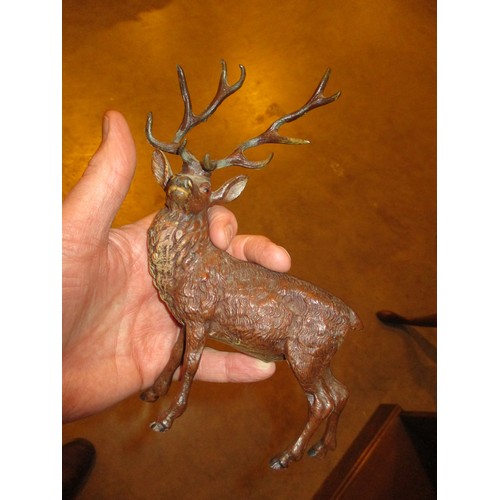 319 - Two Cold Painted Stag Figurines and a Pair of Stag Taper Sticks