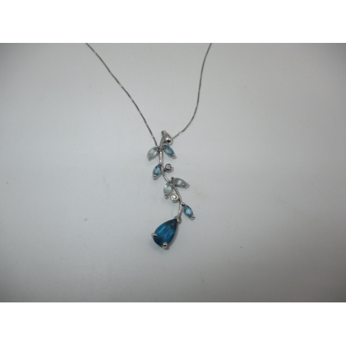 499 - 9ct White Gold Diamond and Blue Gem Pendant on a 9ct Gold Chain