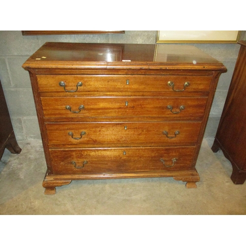 678 - George III Mahogany Chest of 4 Graduated Drawers Flanked by Canted Fluted Corners, Raised Upon Ogee ... 