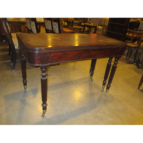 Regency Mahogany Metamorphic Extending Dining Table on 6 Turned and Reeded Legs with 3 Leaves, 301cm extended, this table extends from a fold over console table to a 3 leaf dining table with a telescopic action, requires restoration, one castor broken