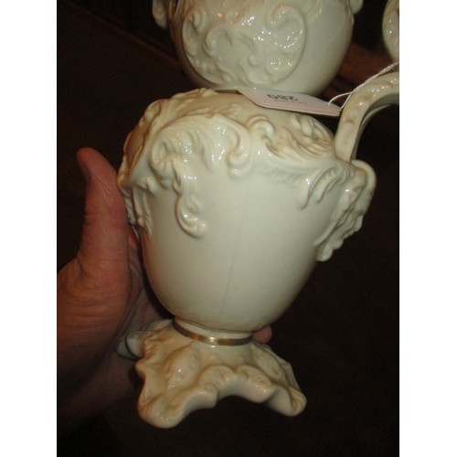 280 - Belleek Ornately Moulded Jug and Collectors Society Vase No 1464, 26 and 20cm