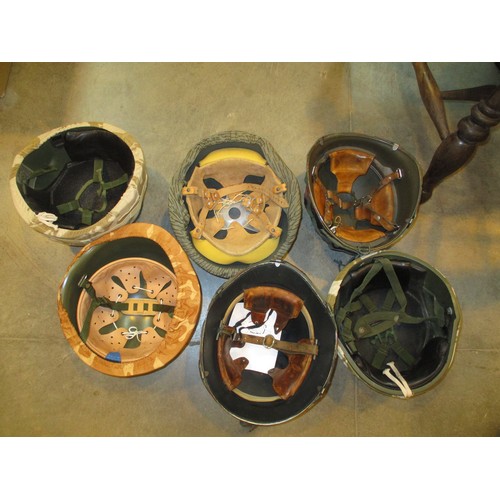 331 - Four Boxes of Military Helmets and Covers etc