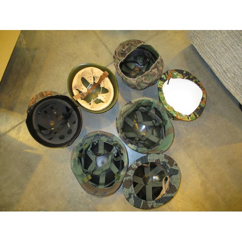 331 - Four Boxes of Military Helmets and Covers etc