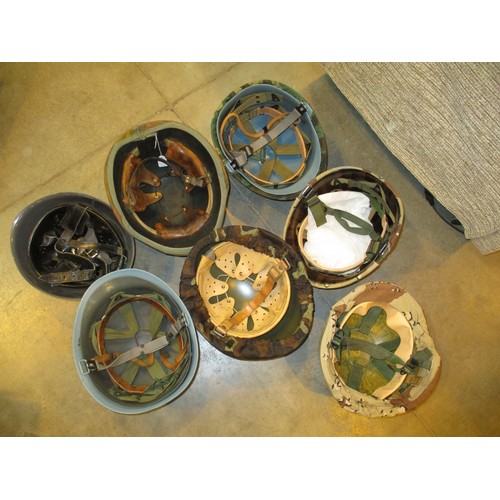 331 - Four Boxes of Military Helmets and Covers etc