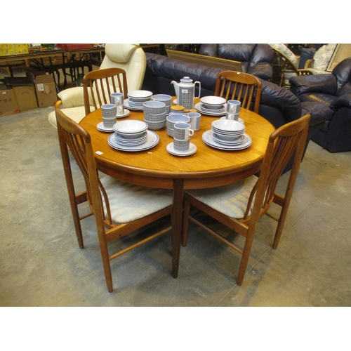 Mid 20th Century G Plan Teak Extending Dining Table, along with 4 Chairs