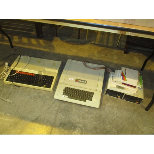 220 - Apple II Europlus Computer and 2 Disc Drives and an Acorn Computer